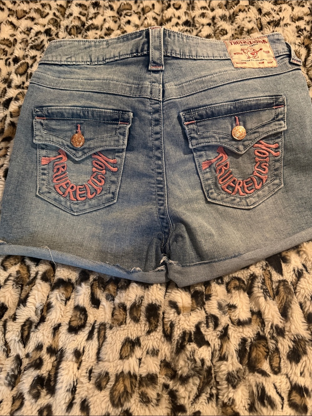 True Religion Light Blue Denim Shorts with Pink Pocket Embroidery
